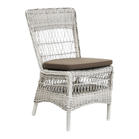Woven white chair with a textured pattern and a brown cushion, ideal for stylish outdoor seating.