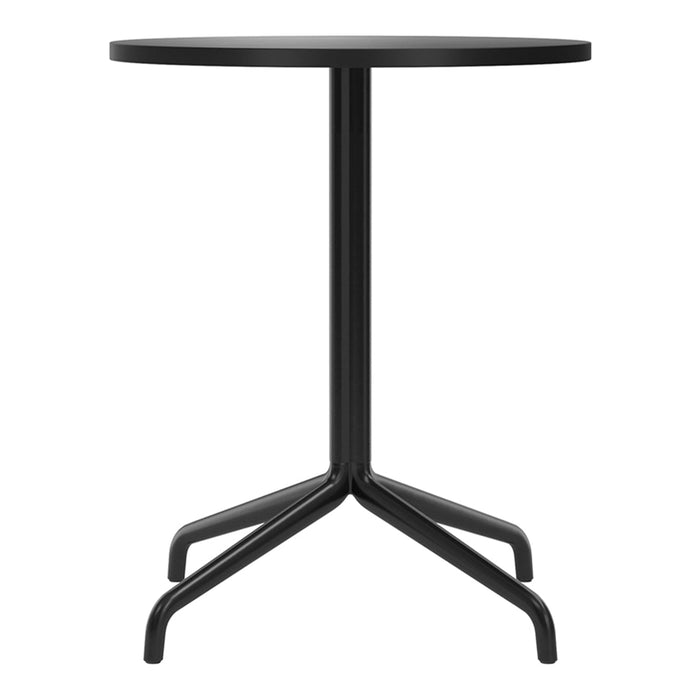 Round black table with a minimalist design featuring a sleek metal frame and a smooth, solid surface.