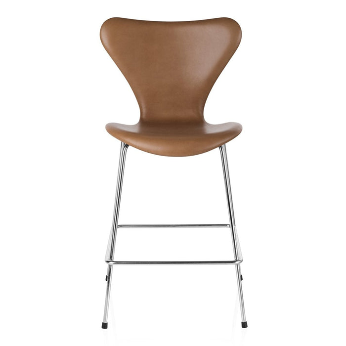 Brown leather bar chair with a sleek, curved design and shiny chrome legs, perfect for modern interiors.