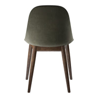 "Olive green upholstered chair with wooden legs, featuring a smooth, minimalist design."