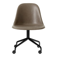 Brown molded chair with a smooth surface and a black, wheeled base. Perfect for modern, minimalist decor.