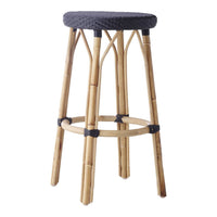 Black woven seat on natural bamboo frame, featuring a minimalist design and contrasting colors. Perfect for modern spaces.