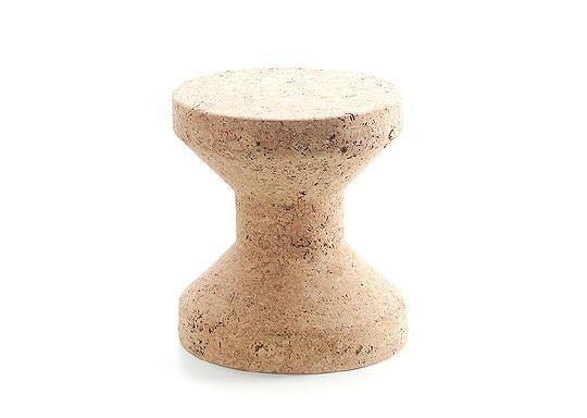 Cork stool in natural beige tones with a smooth, textured surface and minimalist hourglass shape.