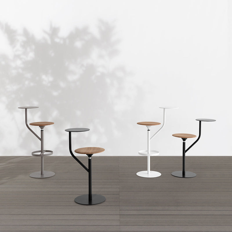 Set of four modern bar stools featuring wood seats and sleek black, white, and grey metal bases.