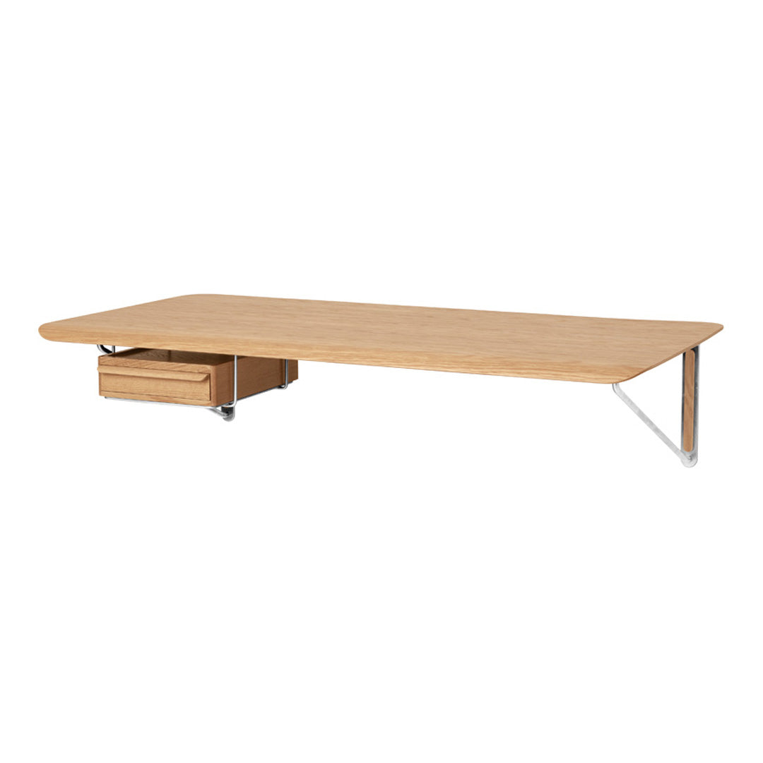 Light wood table featuring a smooth finish and sleek design with a subtle natural grain pattern.