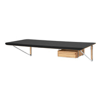 Sleek black tabletop with a wooden drawer and chrome legs, modern design for contemporary spaces.