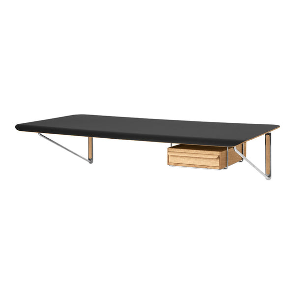 Sleek black tabletop with a natural wood drawer and metallic accents, offering a modern and minimalist design.