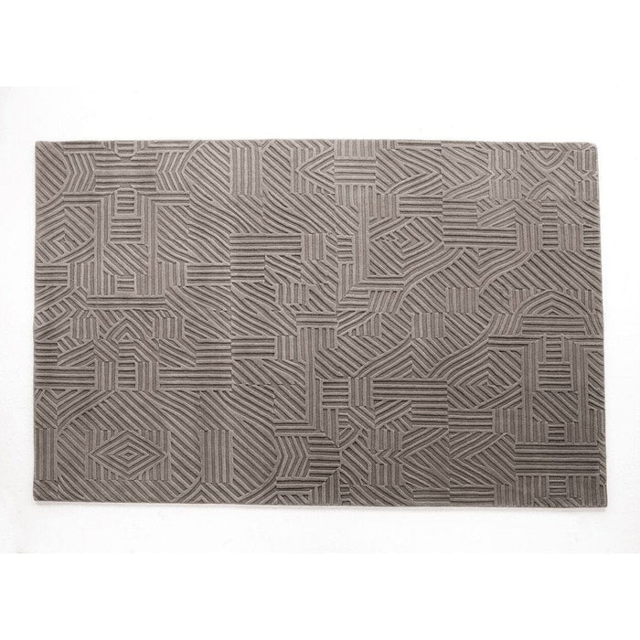 Gray geometric patterned rug with intricate line designs. Stylish and modern home decor accent.