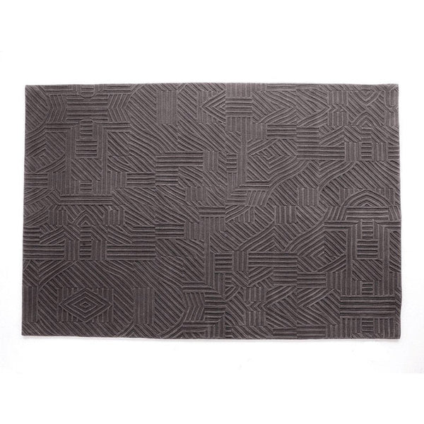 Dark gray rectangular rug featuring a modern, geometric pattern with textured lines. Perfect for contemporary decor.