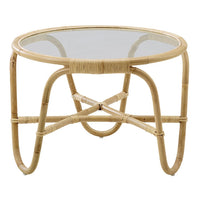 Natural wicker coffee table with a round glass top and elegant woven design. Ideal for modern, boho decor.