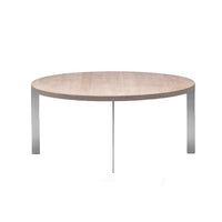 Round coffee table with a light wood top and sleek silver metal legs, showcasing a minimalist design.