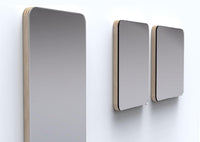 Set of three modern gray mirrors with a sleek wooden frame, featuring smooth, reflective surfaces against a white wall.