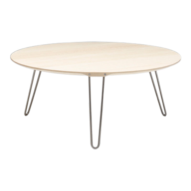 Light wood round coffee table with minimalist metal legs, featuring a smooth surface and sleek design.