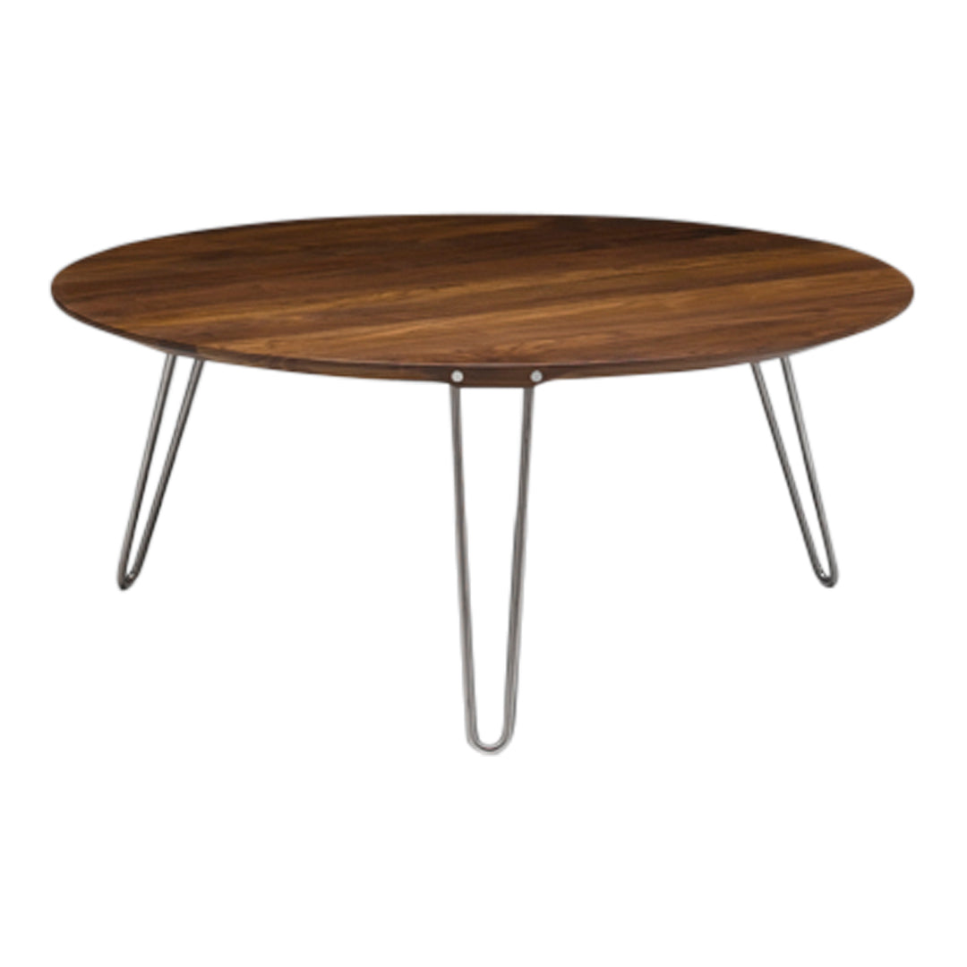 Brown wood circular coffee table with sleek silver legs, featuring a smooth, minimalist design.