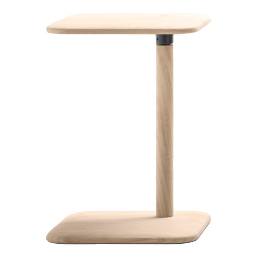 Light natural wood side table with a smooth, modern design and minimalist shape, featuring soft rounded edges.