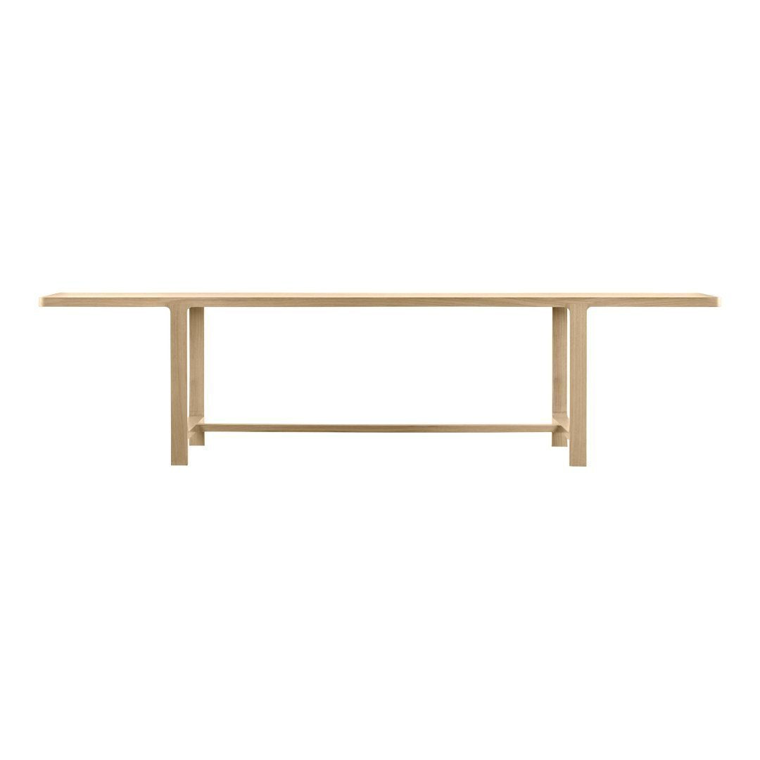 Light natural wood dining table with a sleek, minimalist design and smooth, uniform surface.