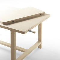 Light natural wood table with clean lines and smooth surfaces, showcasing a minimalist design.