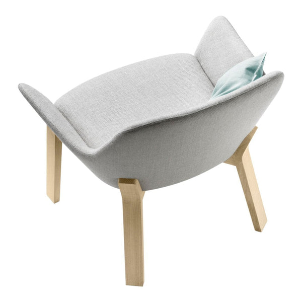 Light gray upholstered chair with a smooth finish and natural wood legs, featuring a subtle blue accent pillow.