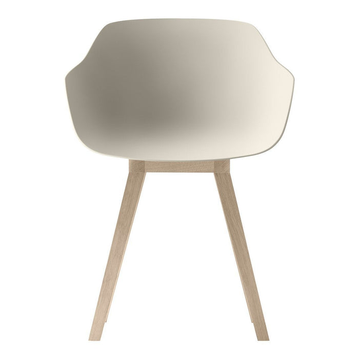 Light cream chair with smooth, minimalist design and wooden legs, perfect for modern styling.