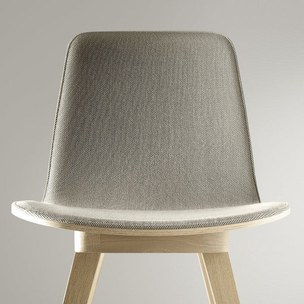 Light grey textured chair with smooth wood legs, perfect for modern decor.
