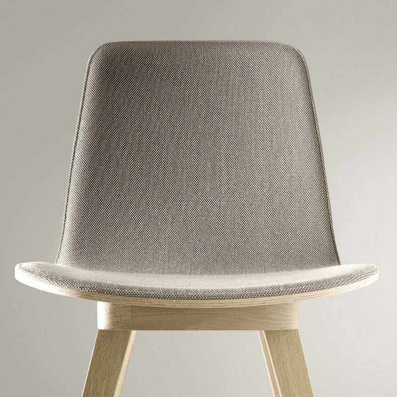 Light grey textured chair with smooth wood legs, perfect for modern decor.