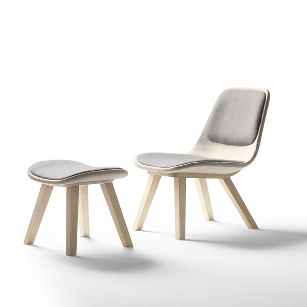 Light gray chair and stool set with smooth, minimalist design and natural wood legs, perfect for modern decor.