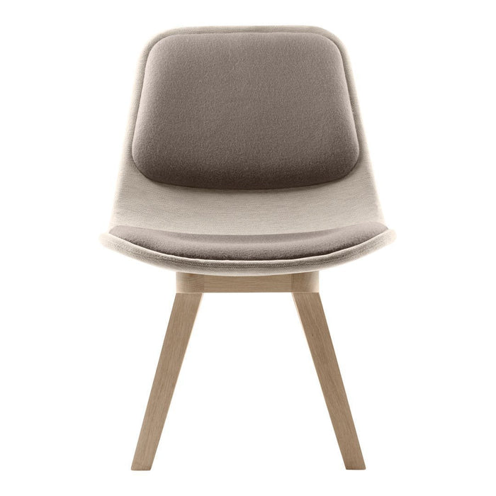 Soft beige upholstered chair with smooth contours and light wooden legs, offering a minimalist aesthetic.