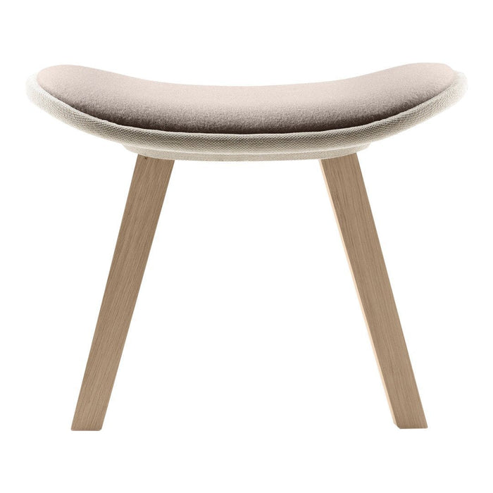 Soft beige upholstered stool with a smooth curved seat and natural wood legs, perfect for modern interiors.