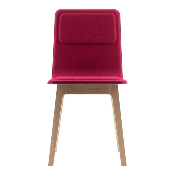 Vibrant fuchsia upholstered dining chair with a smooth wood base and simple, modern design. Ideal for contemporary spaces.