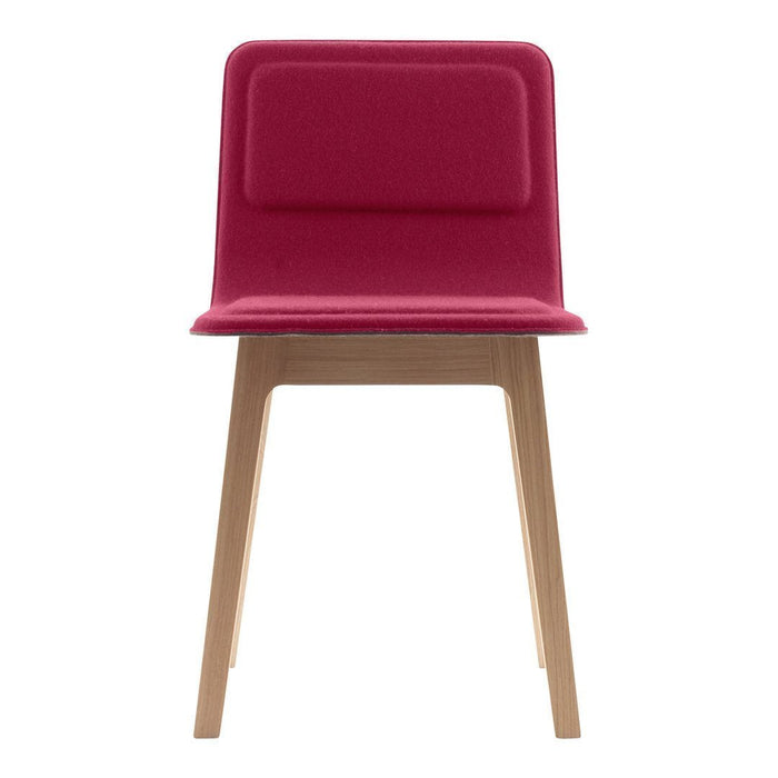 Modern chair with a deep pink upholstered seat and natural wooden legs, showcasing a sleek, minimalist design.
