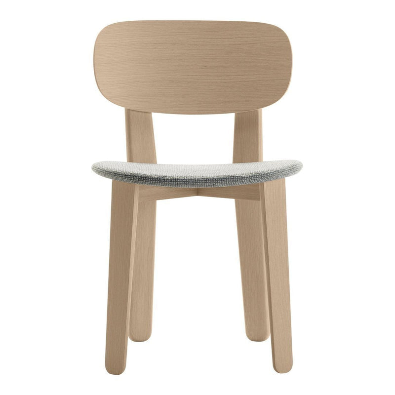 Light wood chair with a smooth, rounded back and a soft gray seat. Minimalist design with natural tones.