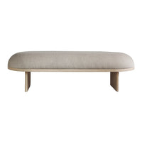 Neutral beige upholstered bench with a smooth, rounded top and minimalist wooden legs.
