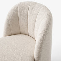 Cream textured upholstery with curved lines, showcasing a soft, neutral color palette. Ideal for modern interiors.