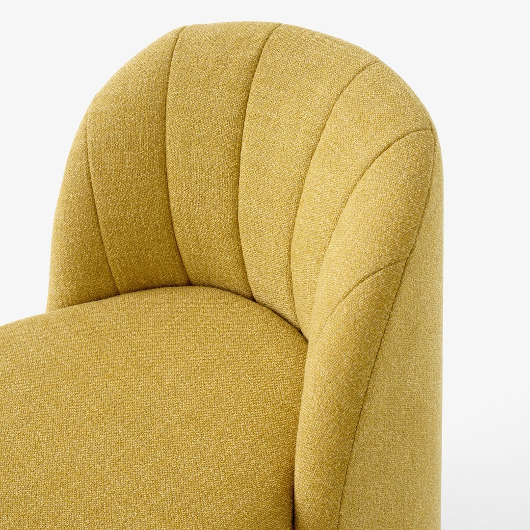 Textured yellow upholstered chair with curved design and subtle striped pattern. Perfect for modern decor.