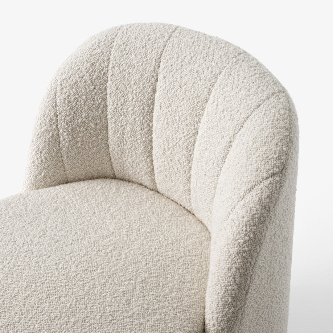 Textured off-white upholstery with subtle quilted pattern, perfect for modern decor.