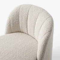 Textured off-white upholstery with subtle quilted pattern, perfect for modern decor.