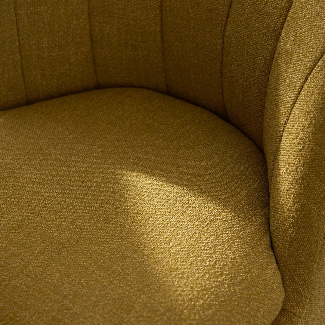 Textured mustard yellow upholstery with subtle, woven patterns for a stylish accent chair.