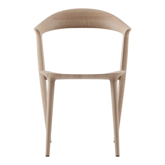 Light oak dining chair with smooth, curved design and minimalist aesthetic. Neutral tone complements any decor.