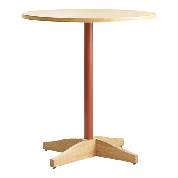 Round wooden table with a light natural wood top and a rust-colored metal pedestal base. Clean, modern design.