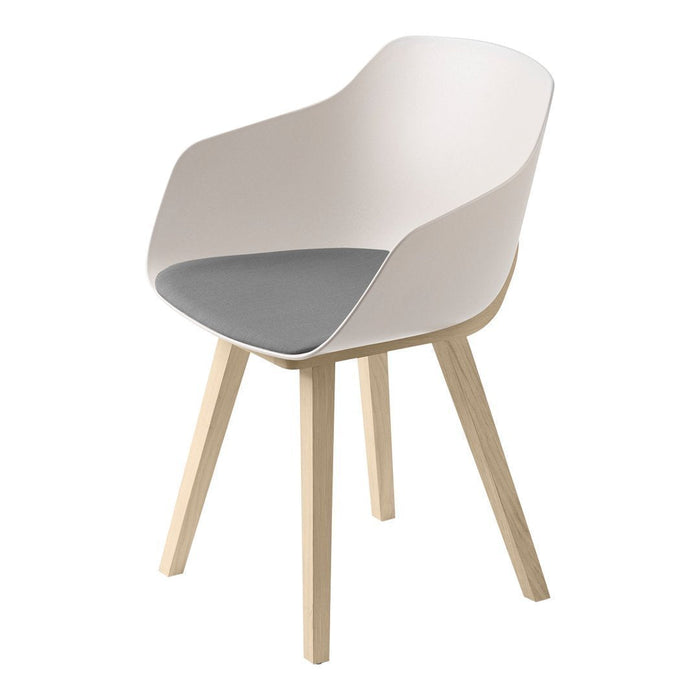 Modern chair with a white curved shell and gray cushion; features natural wood legs for a stylish contrast.