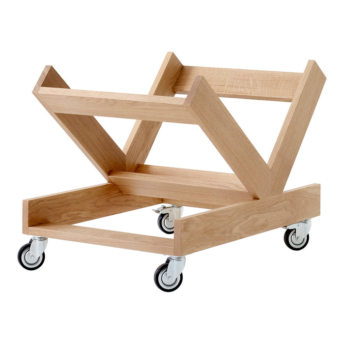 Light wood rolling cart with a geometric open design and smooth wheels for easy maneuverability.