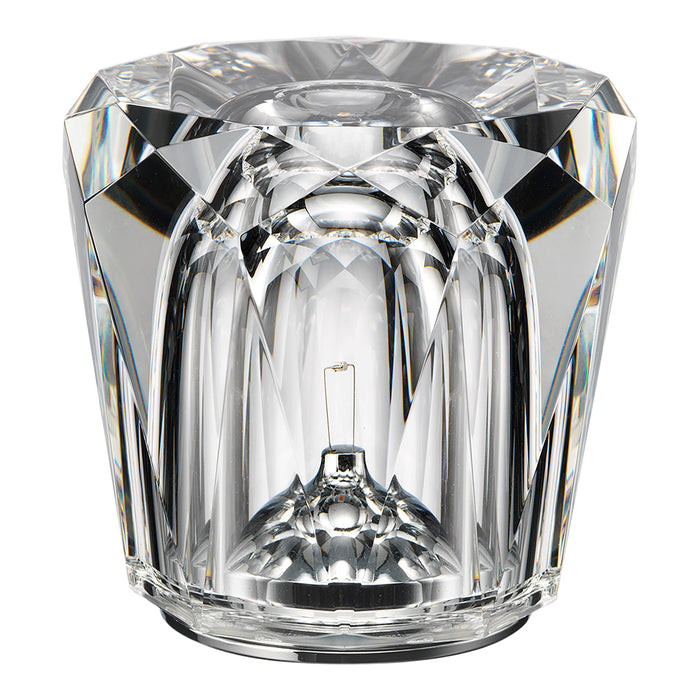 Crystal glass candle holder featuring a faceted design with clear, shimmering surfaces and prismatic reflections.
