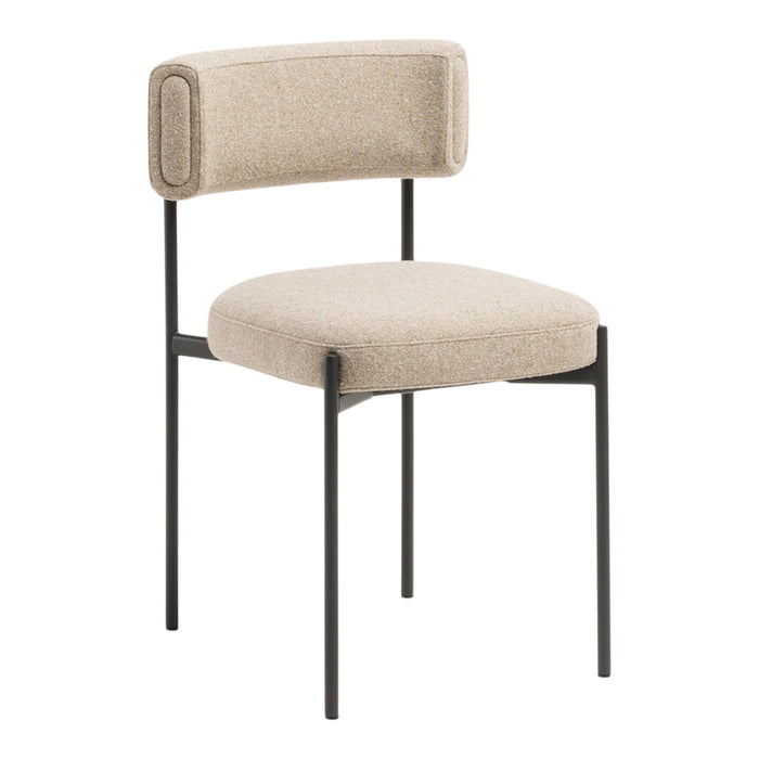 Beige upholstered chair with a minimalist design and black metal frame, featuring a smooth, textured finish.