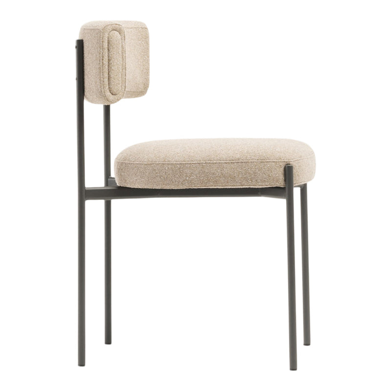 Stylish beige chair with a textured cushion and sleek black frame, perfect for modern decor.