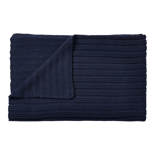 Dark navy blue knitted blanket with a textured ribbed pattern, folded for display. Perfect for cozy decor.