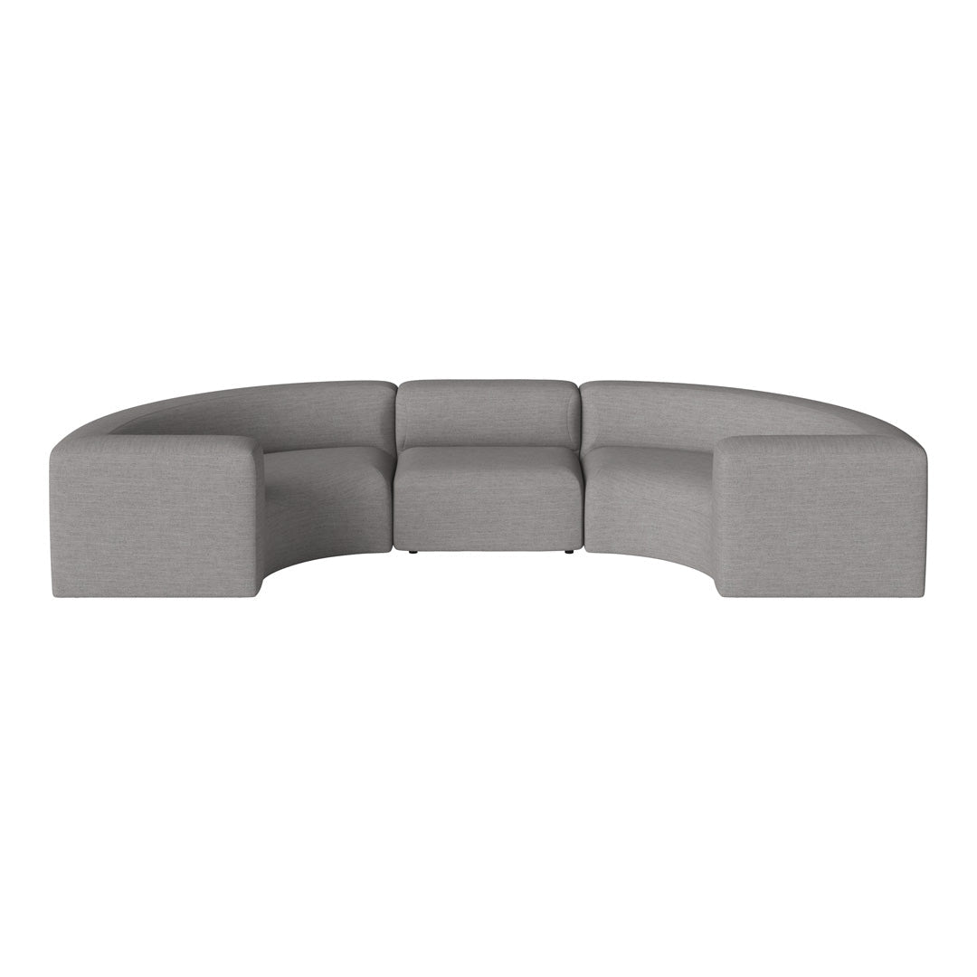 Curved gray sectional sofa with a textured fabric and minimalist design, perfect for modern living spaces.