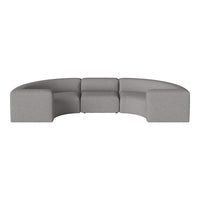 Curved gray sectional sofa with a textured fabric and minimalist design, perfect for modern living spaces.