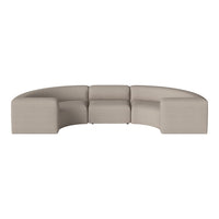 Curved sectional sofa in a soft beige fabric with a smooth, minimalist design. Perfect for modern interiors.
