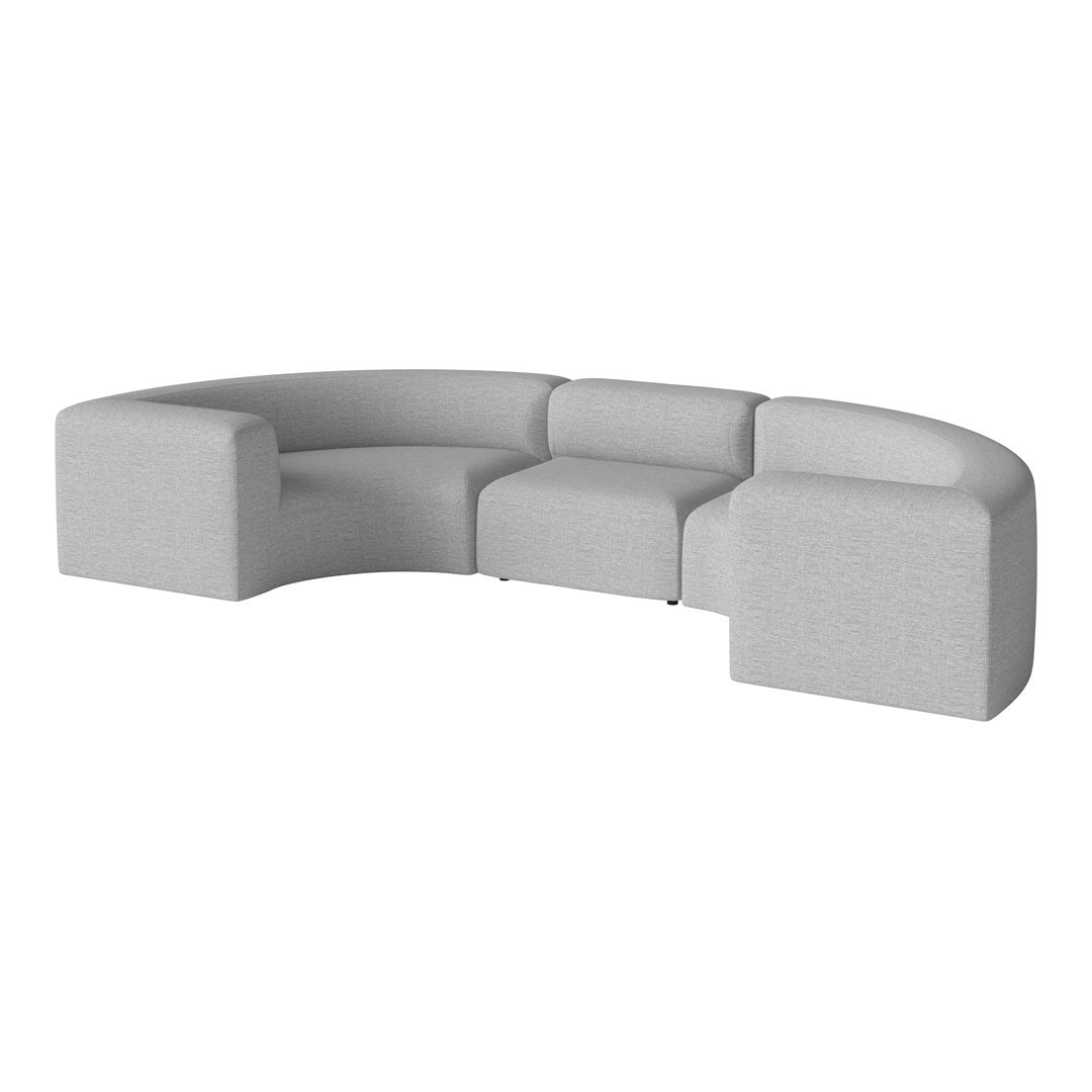 Curved sofa in light gray upholstery with a soft, textured pattern for modern interiors.