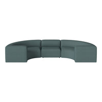 Curved teal sofa upholstered in a textured fabric, featuring sleek geometric shapes and a modern design.